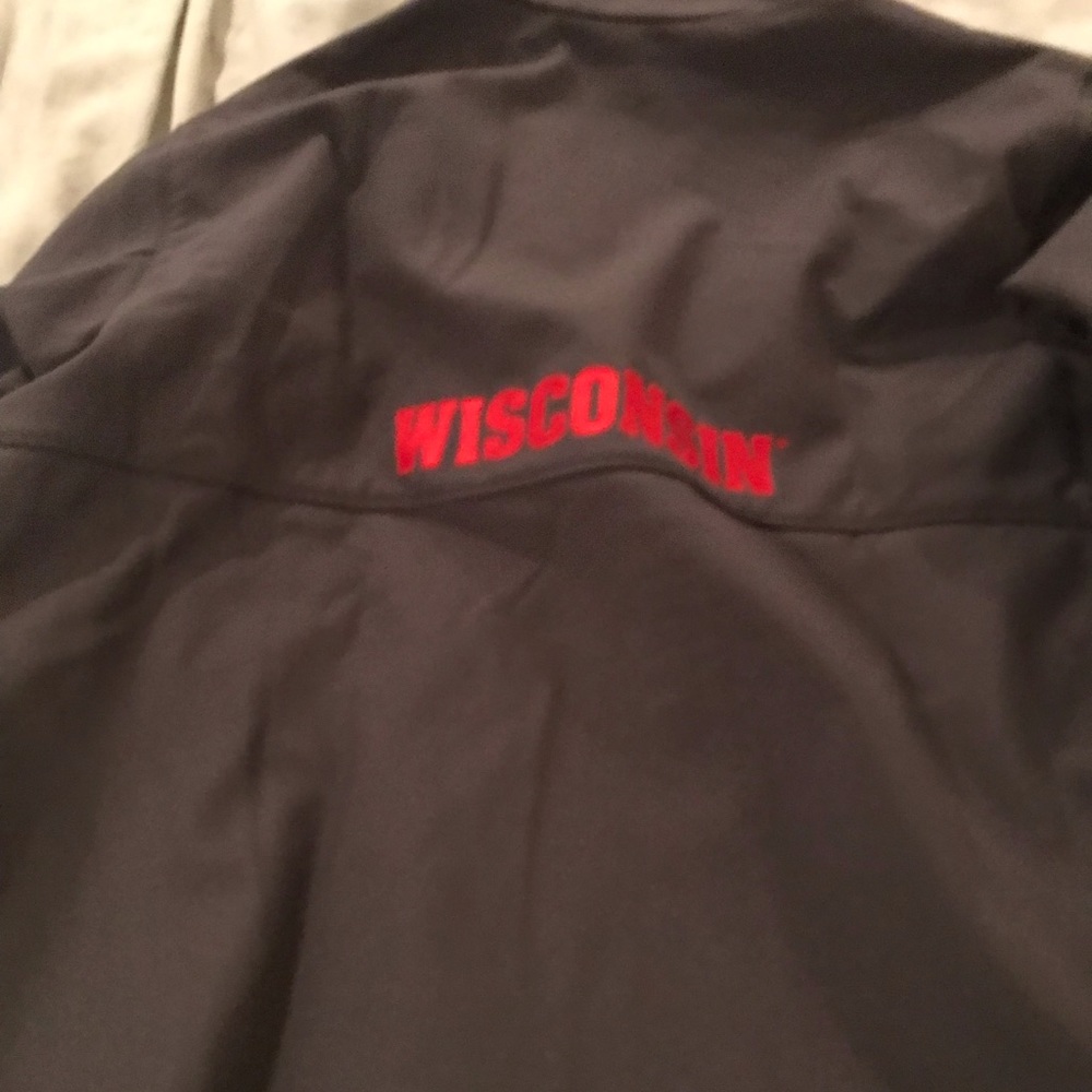 New Wisconsin jacket never worn.